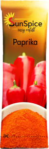 Paprikapulver Tütchen der Beispielfirma Sunspice, darauf abgebildet sind Paprika vor einem Sonnenuntergang